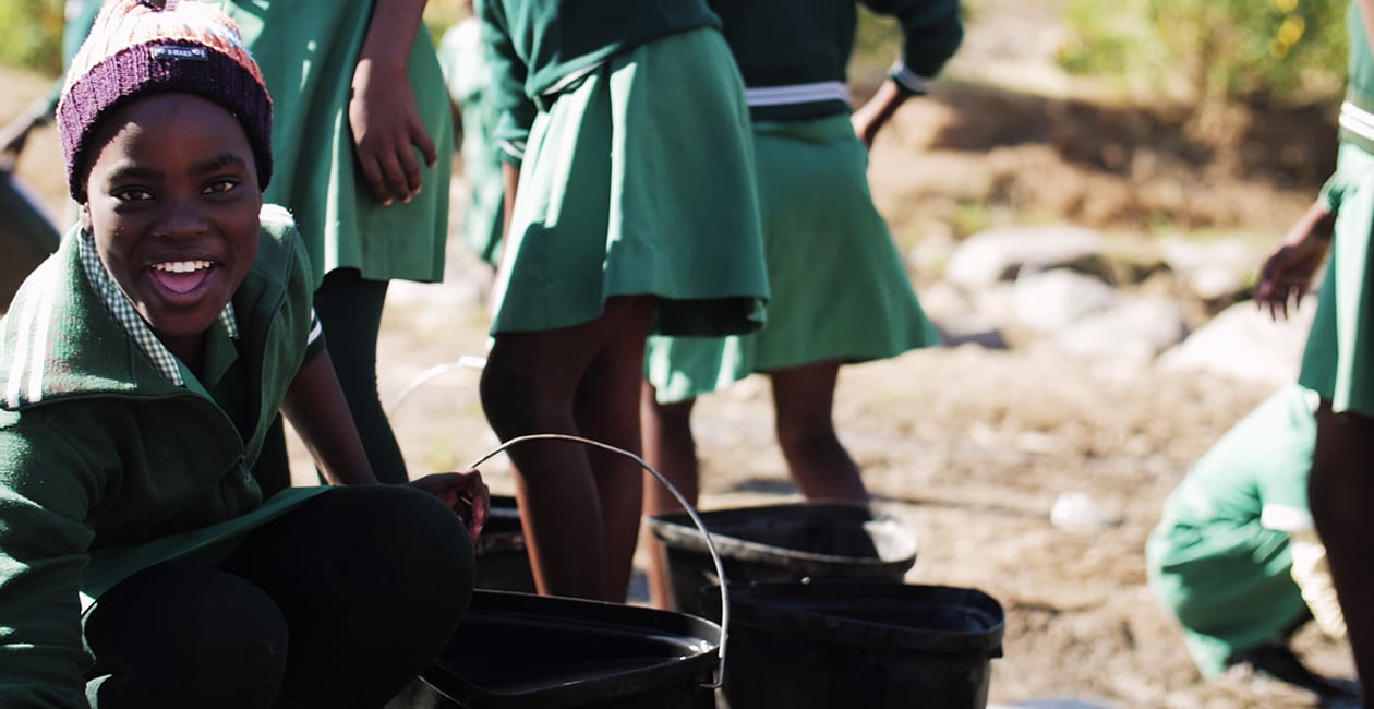sbs tanks water girls collecting water